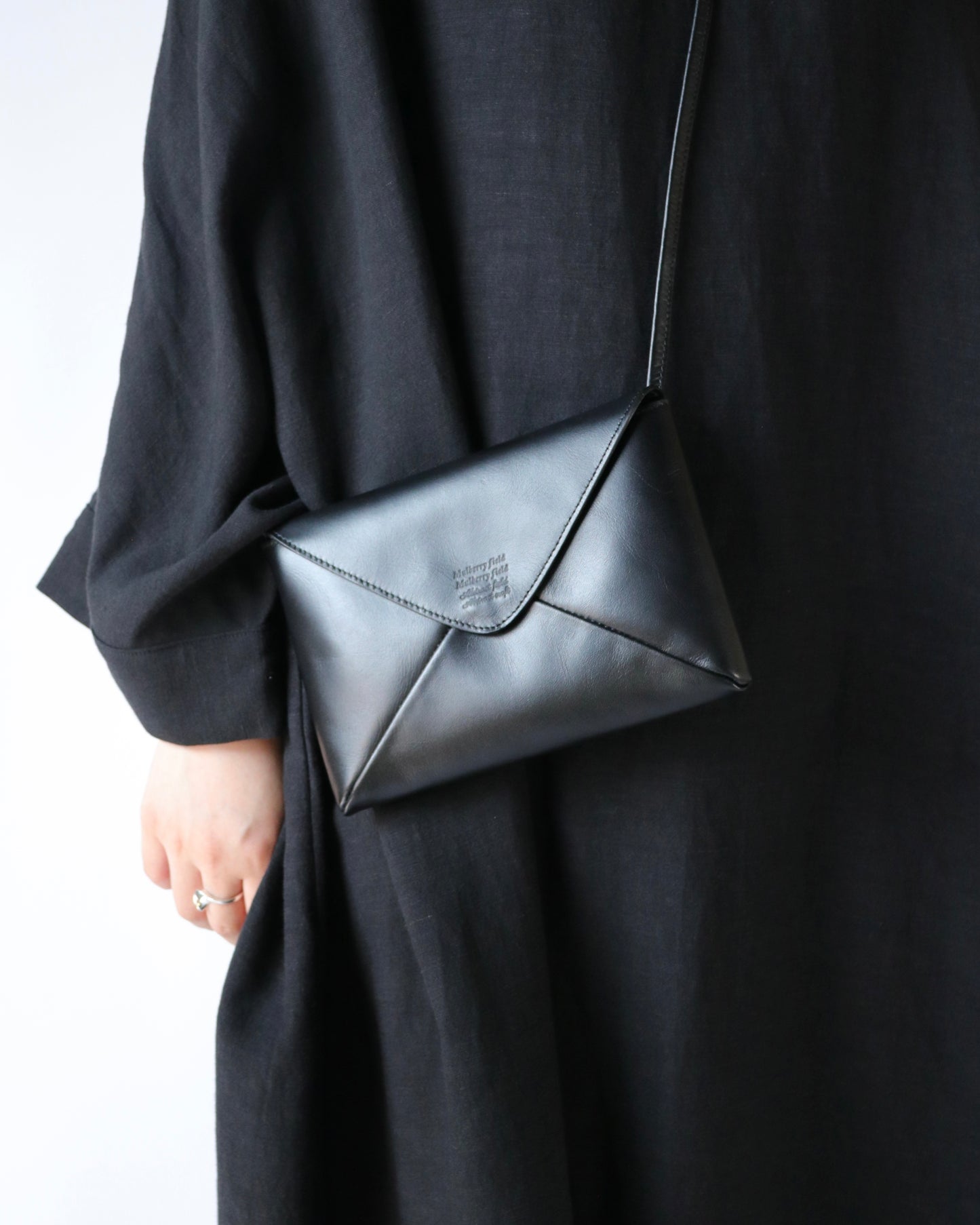 Naturally-tanned leather envelope purse