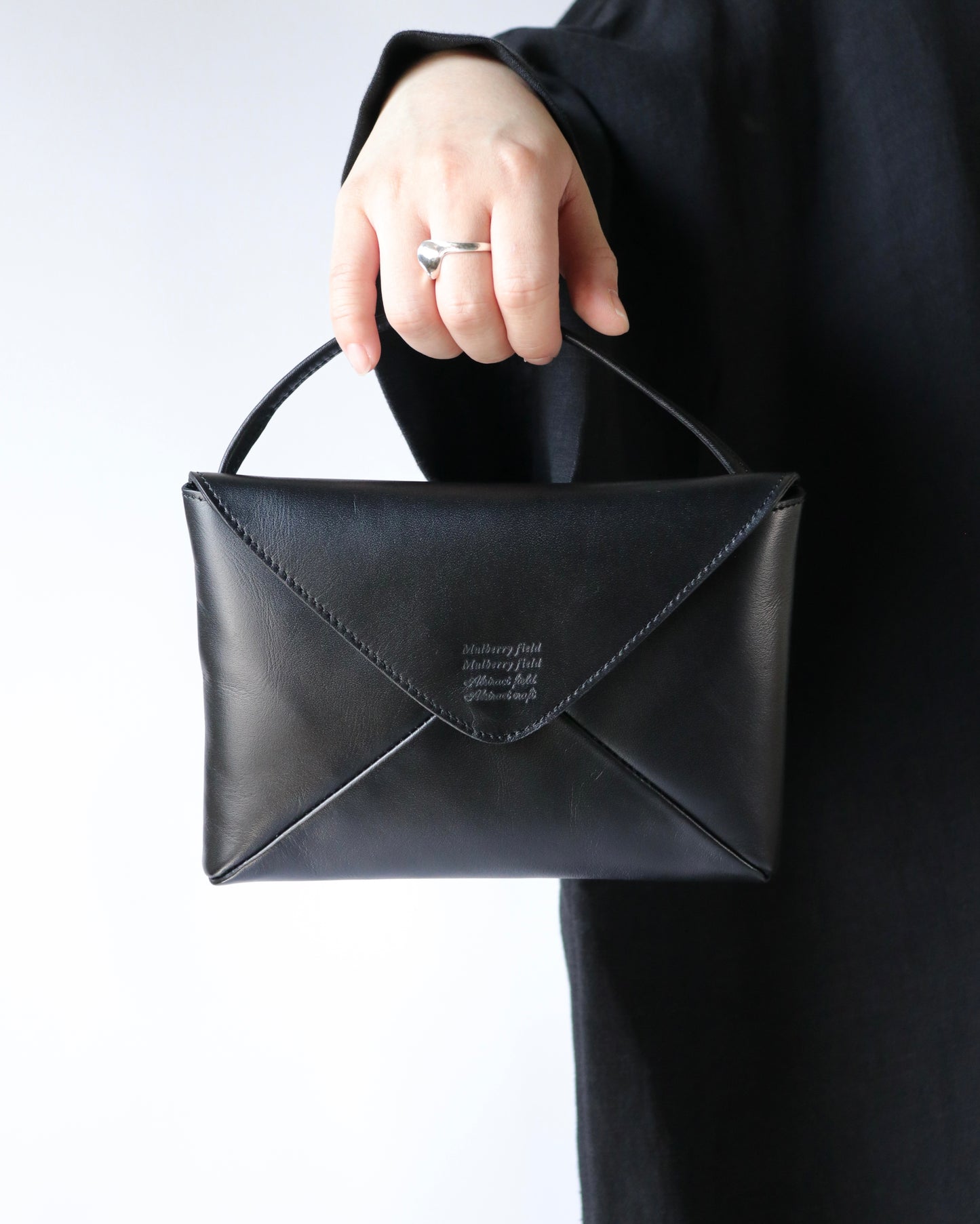 Naturally-tanned leather envelope purse