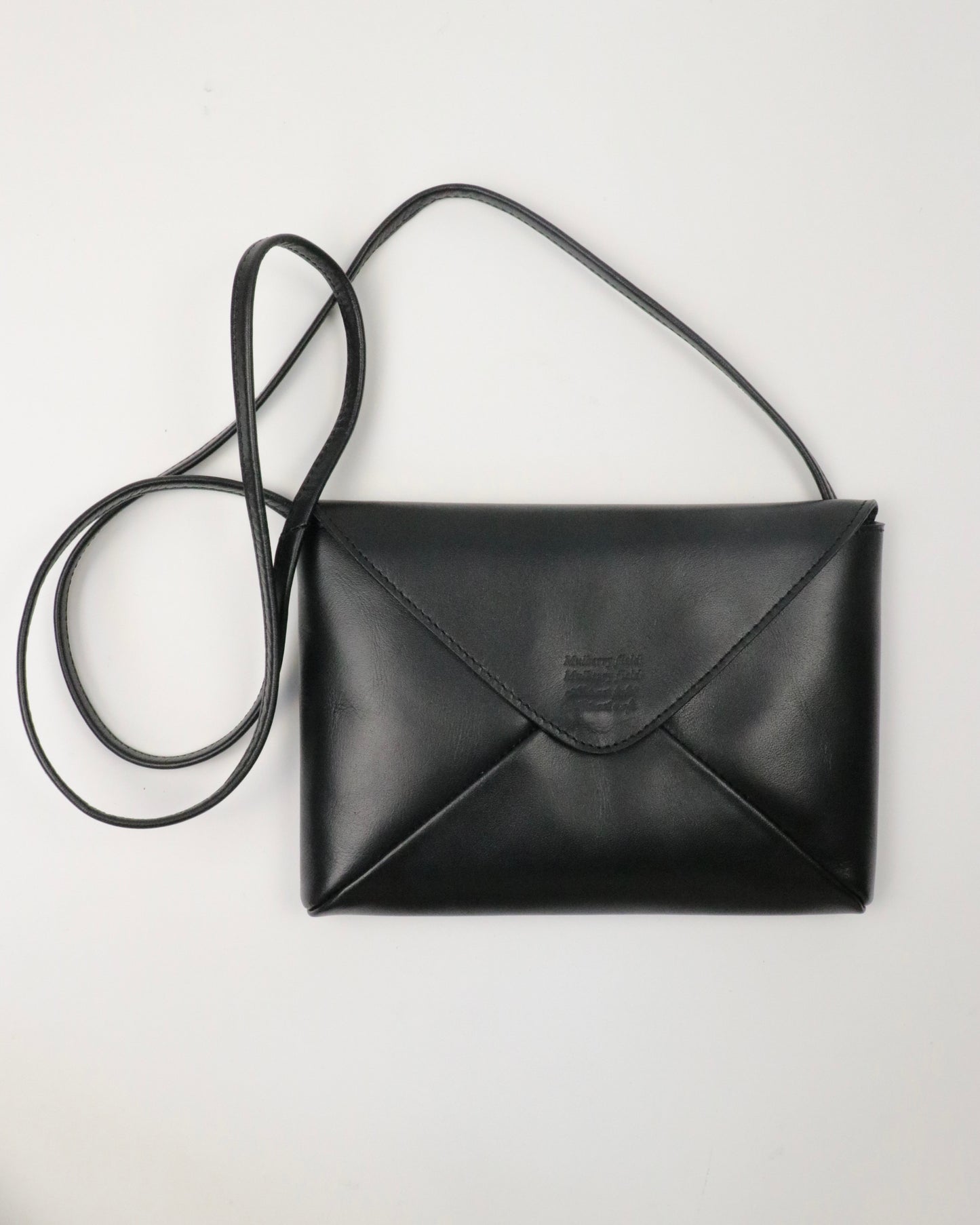 Naturally-tanned leather envelope purse