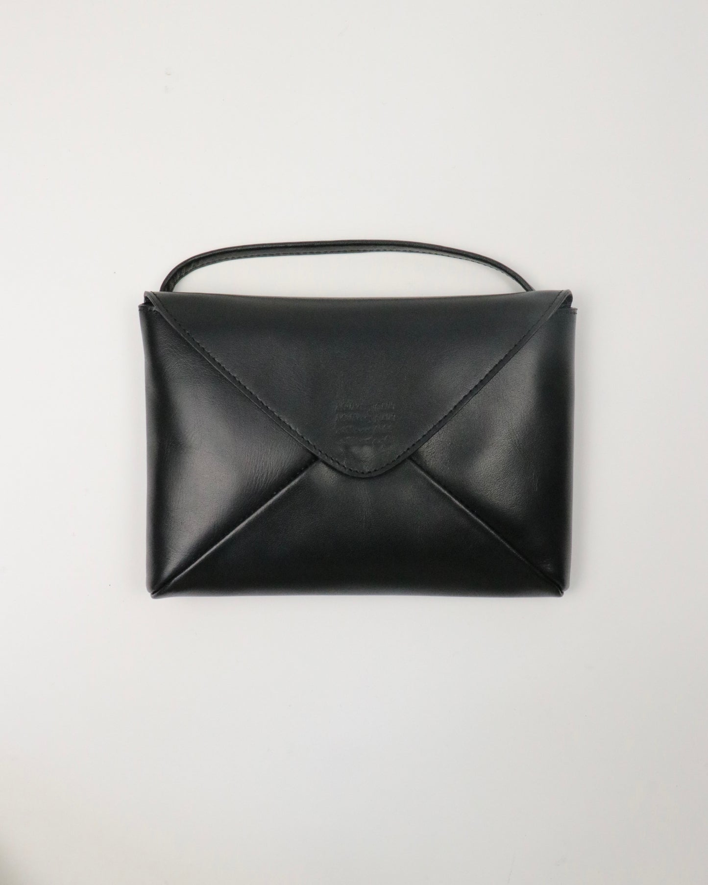 Naturally-tanned leather envelope purse