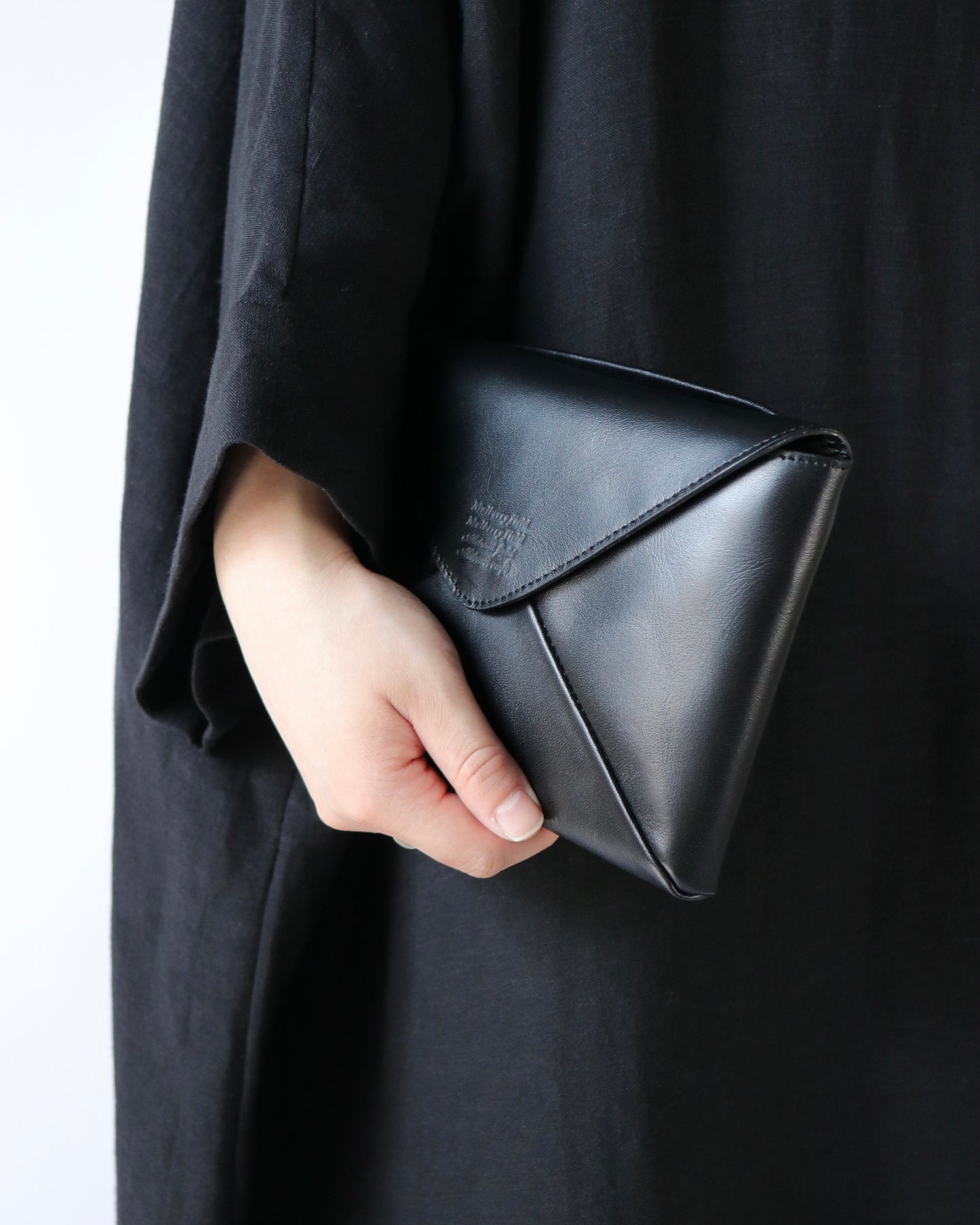 Naturally-tanned leather envelope purse