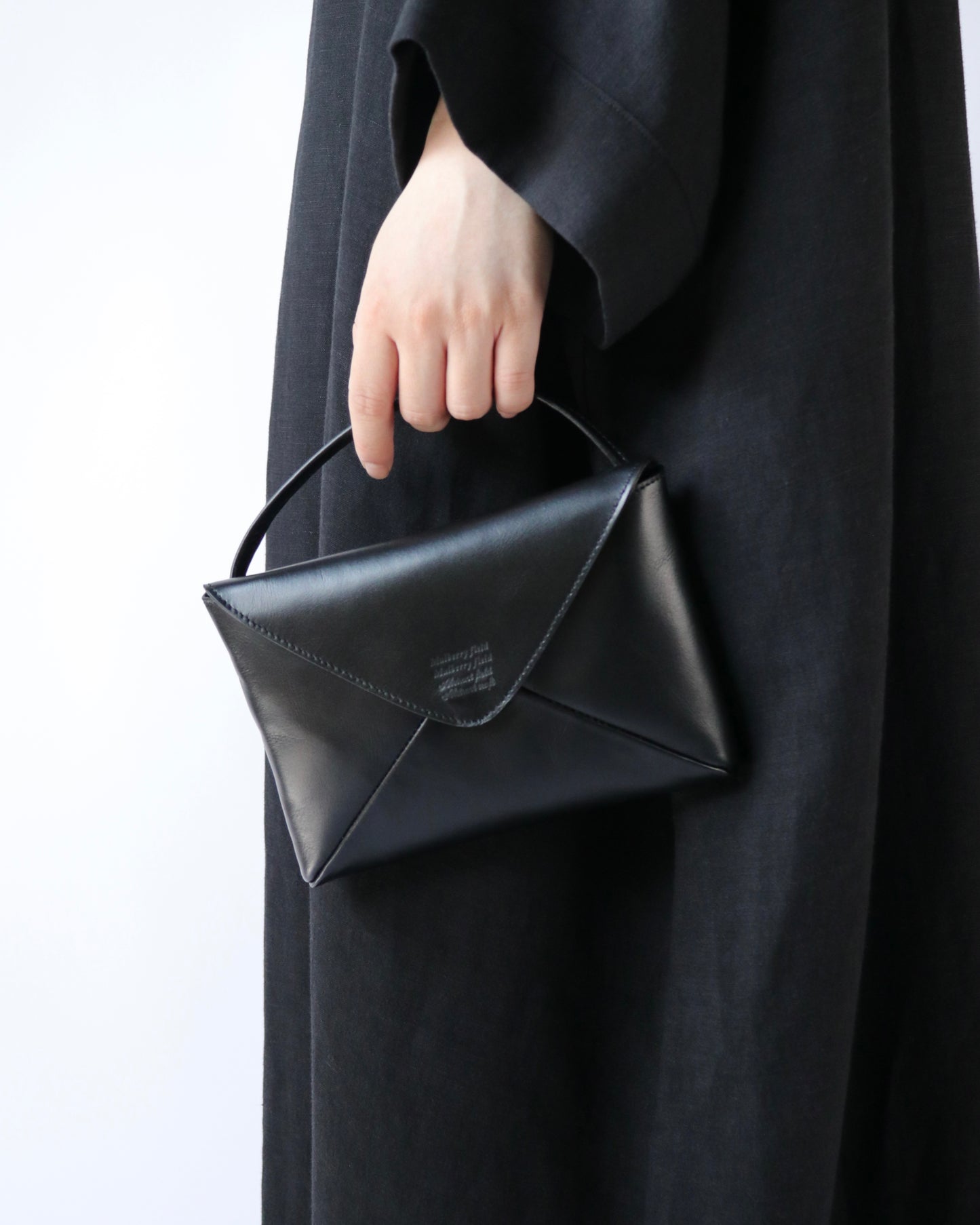Naturally-tanned leather envelope purse