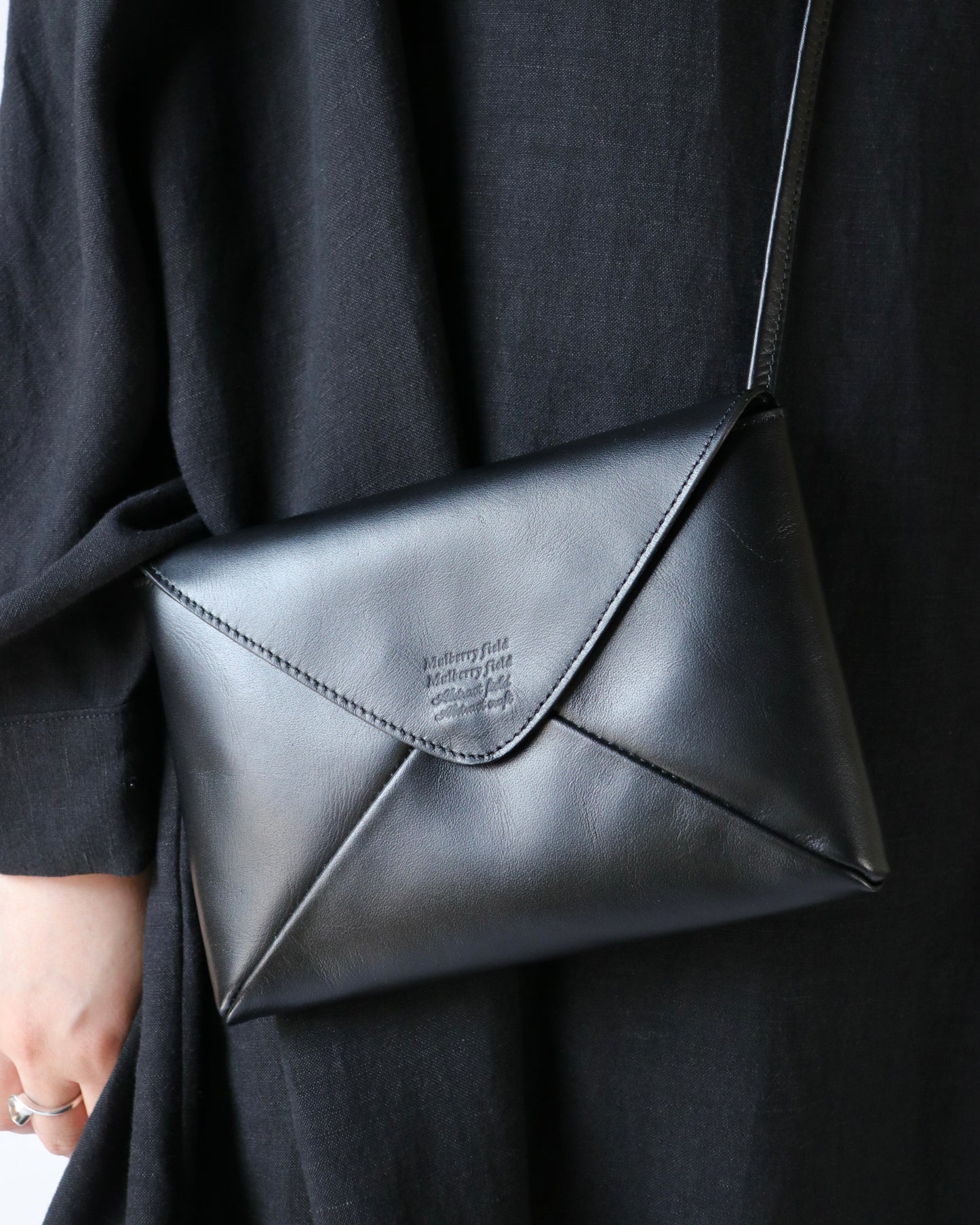 Naturally-tanned leather envelope purse