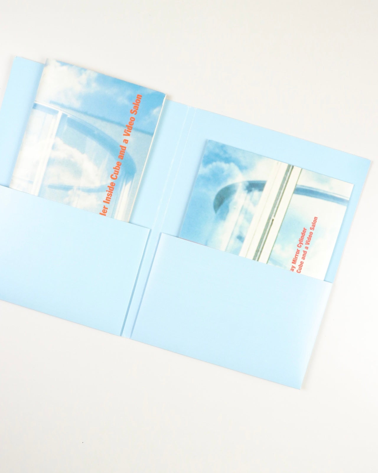 TWO-WAY MIRROR CYLINDER INCIDE CUBE AND A VIDEO SALON by Dan Graham