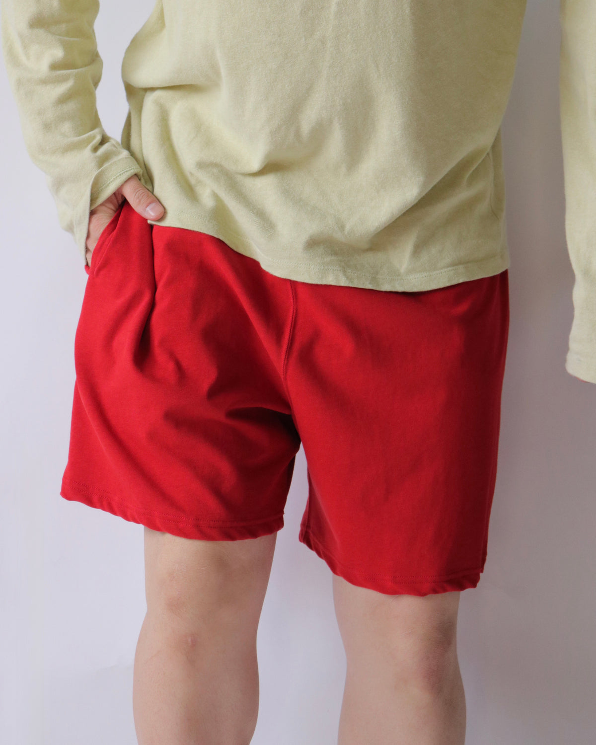 well / title logo shorts red